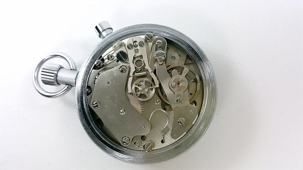 Chronomètre HEUER-LEONIDAS ref. 513.202 à rattrapante --- calibre 7711 --- ikonicstopwatch.com