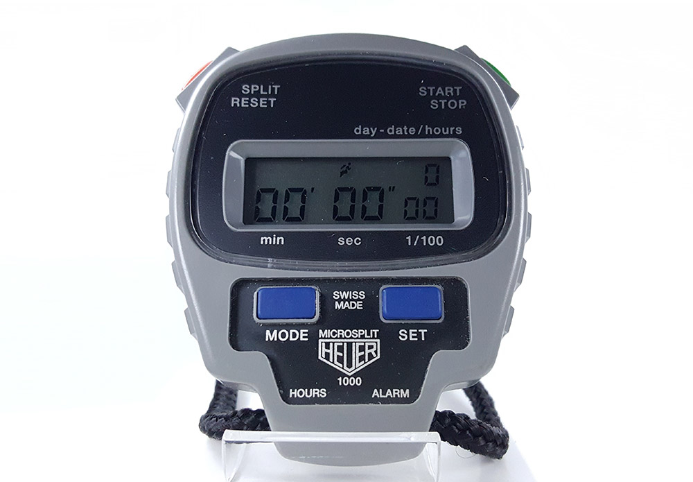 Chronomètre vintage HEUER-Leonidas microsplit ref. 1000 --- plan rapproché (couverture) --- ikonicstopwatch.com