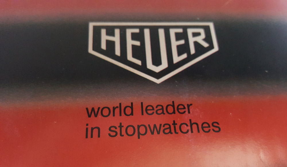 Vintage english 1981 HEUER stopwatch catalog --- frontpage logo --- ikonicstopwatch.com