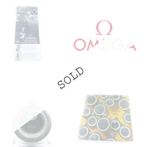 Omega package (rare catalog + FIFA booklet + stopwatch ref. mg 6306) --- checkerboard composition for the thumbnail picture (sold version) --- ikonicstopwatch.com