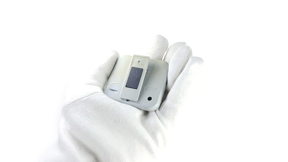 Vintage HEUER stopwatch ref. 750 - microsplit lab timer --- back view hand held close-up shot --- ikonicstopwatch.com