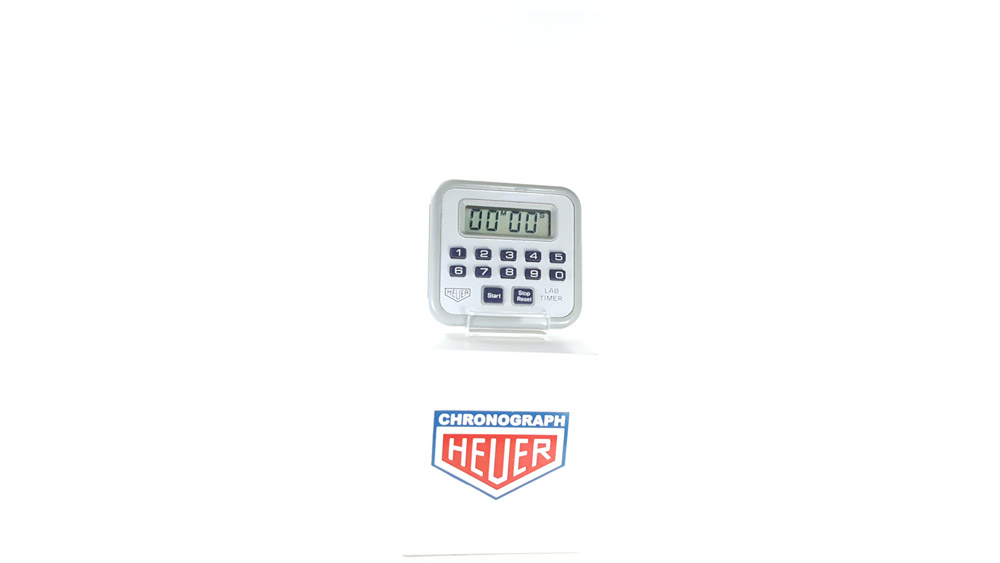 Vintage HEUER stopwatch ref. 750 - microsplit lab timer --- wide shot --- ikonicstopwatch.com